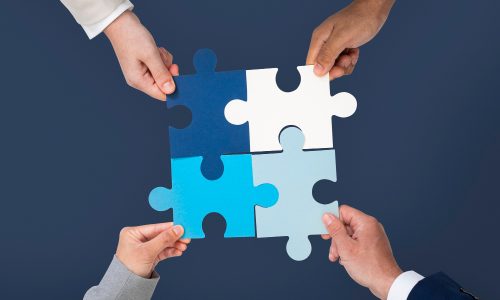 hands-holding-puzzle-business-problem-solving-concept