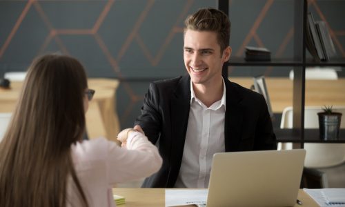 smiling-hr-employer-handshaking-successful-job-applicant-hiring-greeting